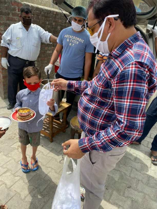 Home made clothes masks distributed in slum area